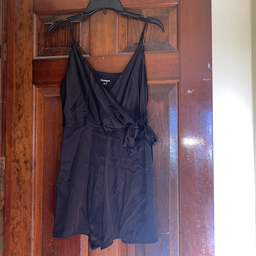 Black romper with attached belt from Express size small